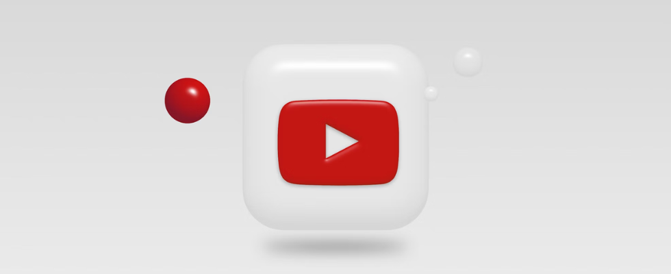 YouTube-Logo vor weißem Hintergrund mit rotem Punkt